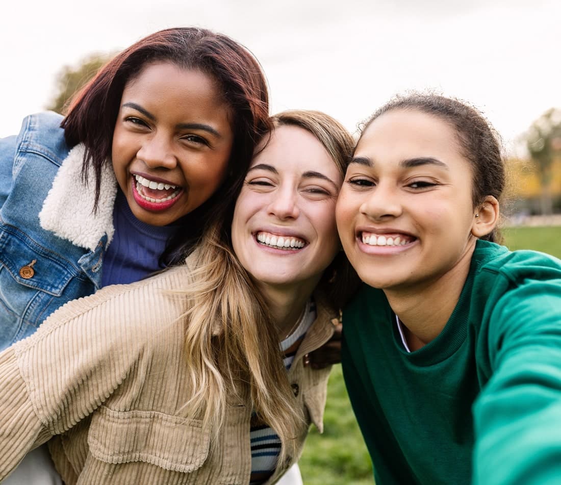 Girls smiling after orthodontic care in South Jordan UT