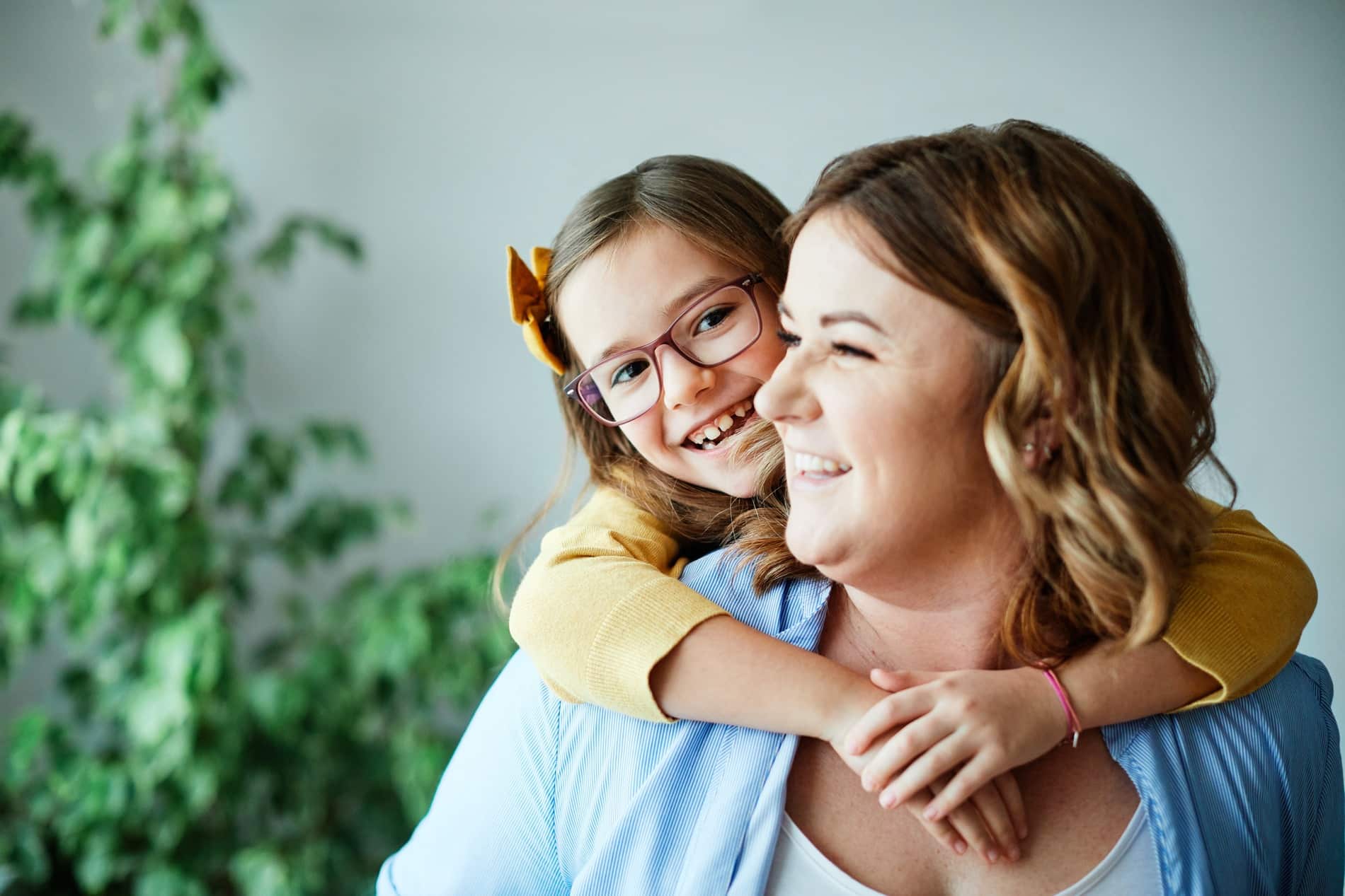 Mother and daughter playing together after Growth Modification & Airway-Focused Orthodontics in South Jordan, UT